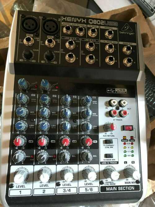 Behringer XENYX Q802usb 8 Input 2 Bus Mixer with Mic Preamps and compressors.