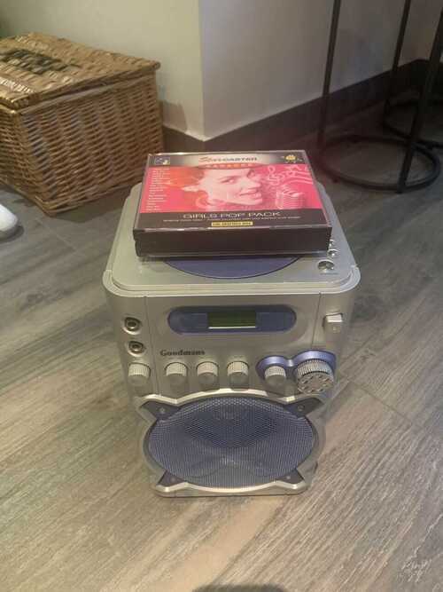 Goodmans Karaoke Machine with CDs. Used but ingood condition.