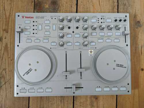 Vestax VCI 100 DJ MIDI Controller for NI Traktor LE. Only slightly used.