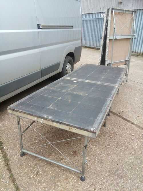 portable staging 8ft x 3ft x 2ft High, Unfolds, Casters for Ease of Movement