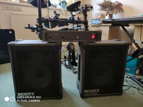 Lyonforge 100W stereo power amplifier and Scott sound systems 100W speakers.